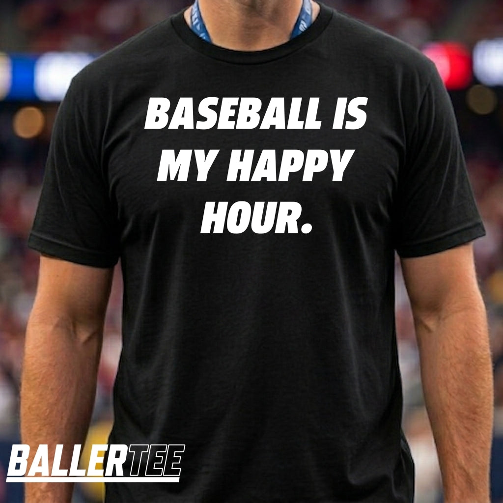 A man wearing a black short-sleeve t-shirt with the phrase 'BASEBALL IS MY HAPPY HOUR.' printed in bold white capital letters across the chest.