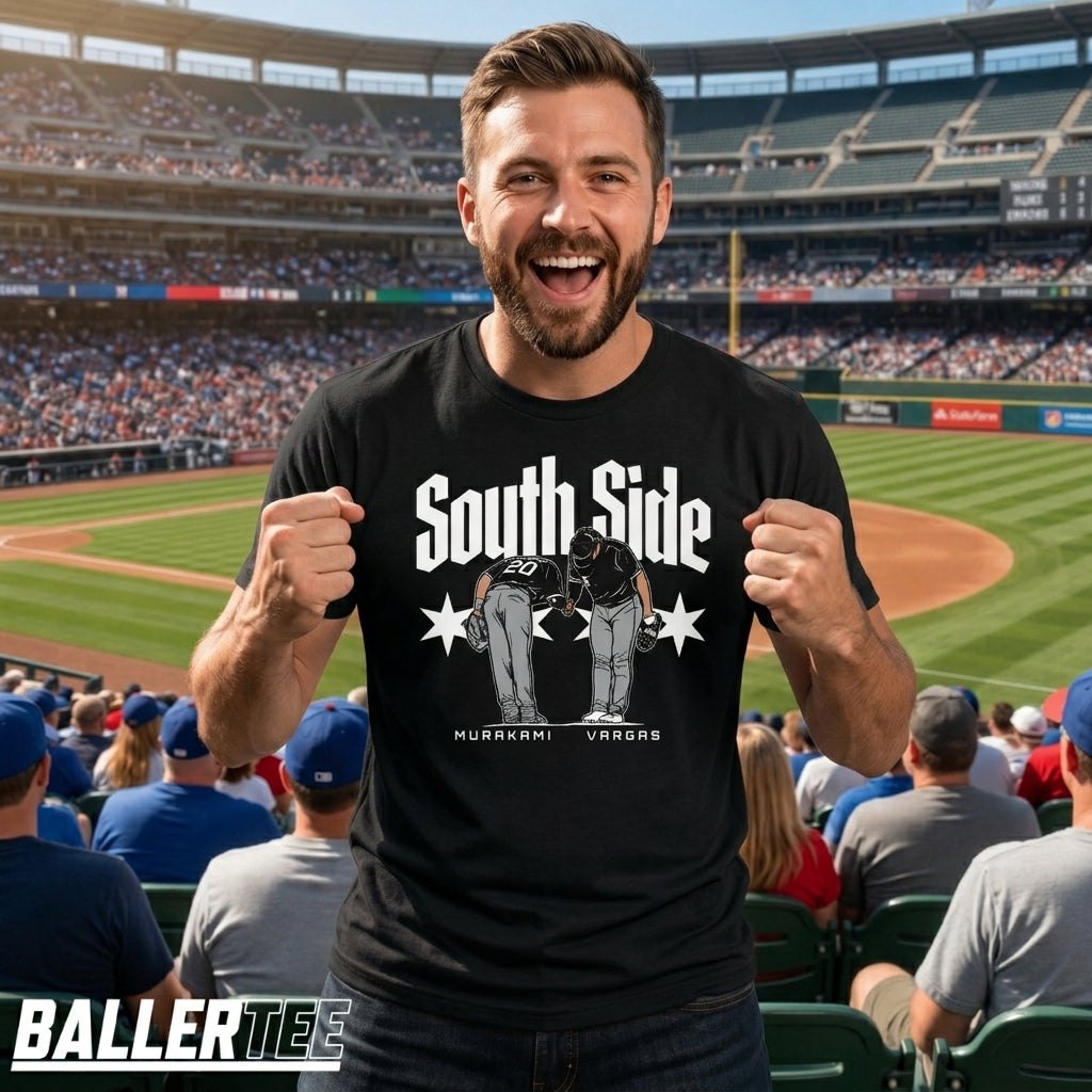A man wearing a black graphic t-shirt with 'South Side Murakami Vanguos' printed in white and gray, standing in a crowded baseball stadium. The BallerTee logo is visible in the bottom-left corner.